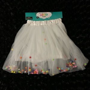 White Tutu Filled With Multicolored Balls